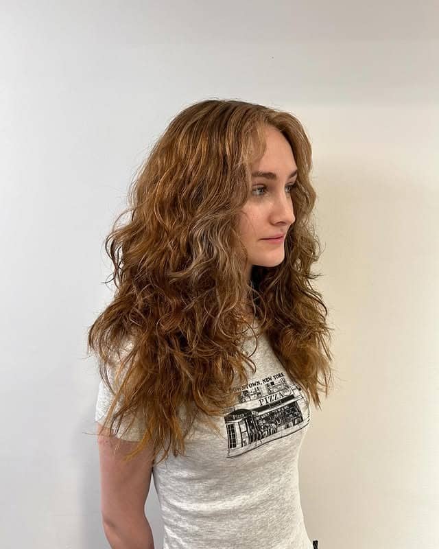 4. Natural Brunette Curly Shag with Textured Layers - Layered Shaggy Hairstyles