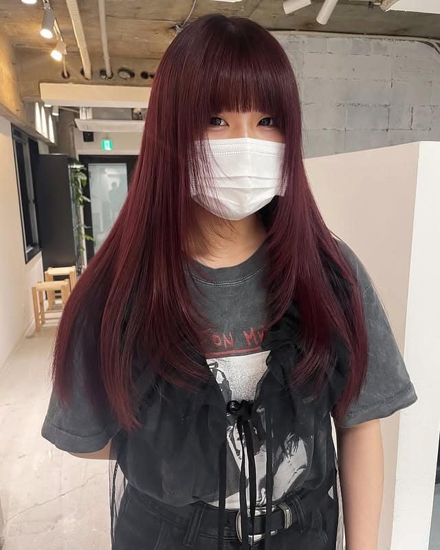 11. Deep Burgundy Sleek Shag with Blunt Fringe - Layered Shaggy Hairstyles