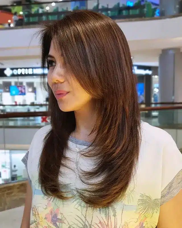 15. Warm Brown Long Shag with Feathered Ends - Layered Shaggy Hairstyles