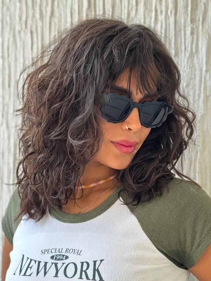 17. Dark Chocolate Voluminous Curly Shag - Layered Shaggy Hairstyles