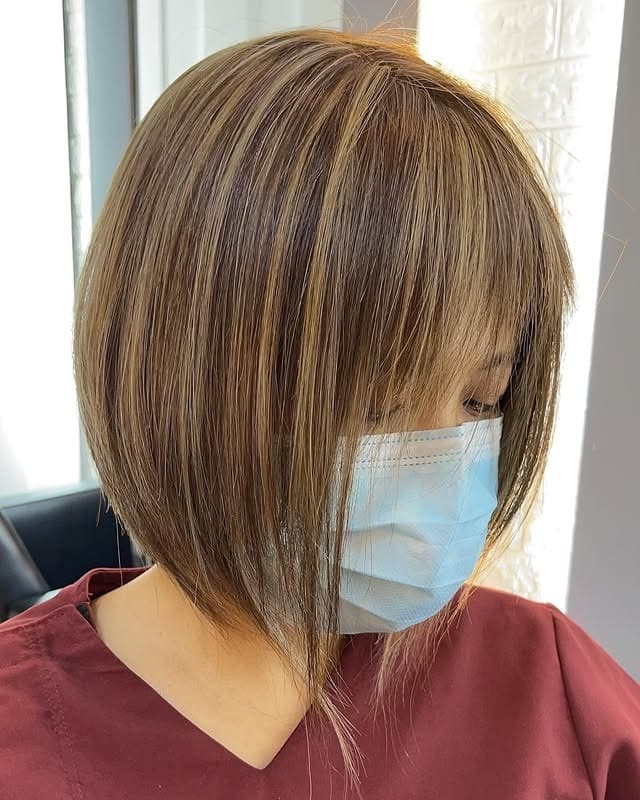 6. Sleek Angled Honey Blonde Wispy Bob - Wispy Bob Hairstyles