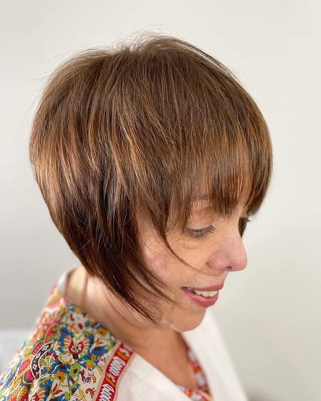 7. Feathered Brunette Wispy Bob with Fringe - Wispy Bob Hairstyles