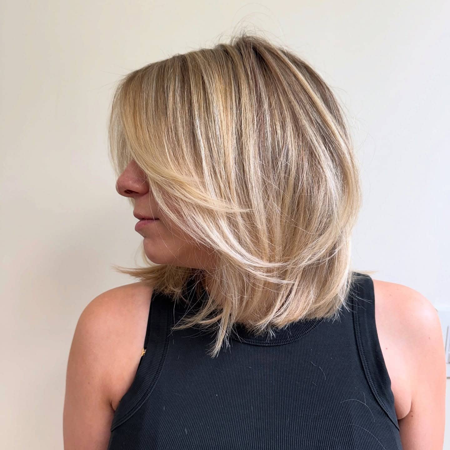 18. Feathered Golden Blonde Layered Wispy Bob - Wispy Bob Hairstyles
