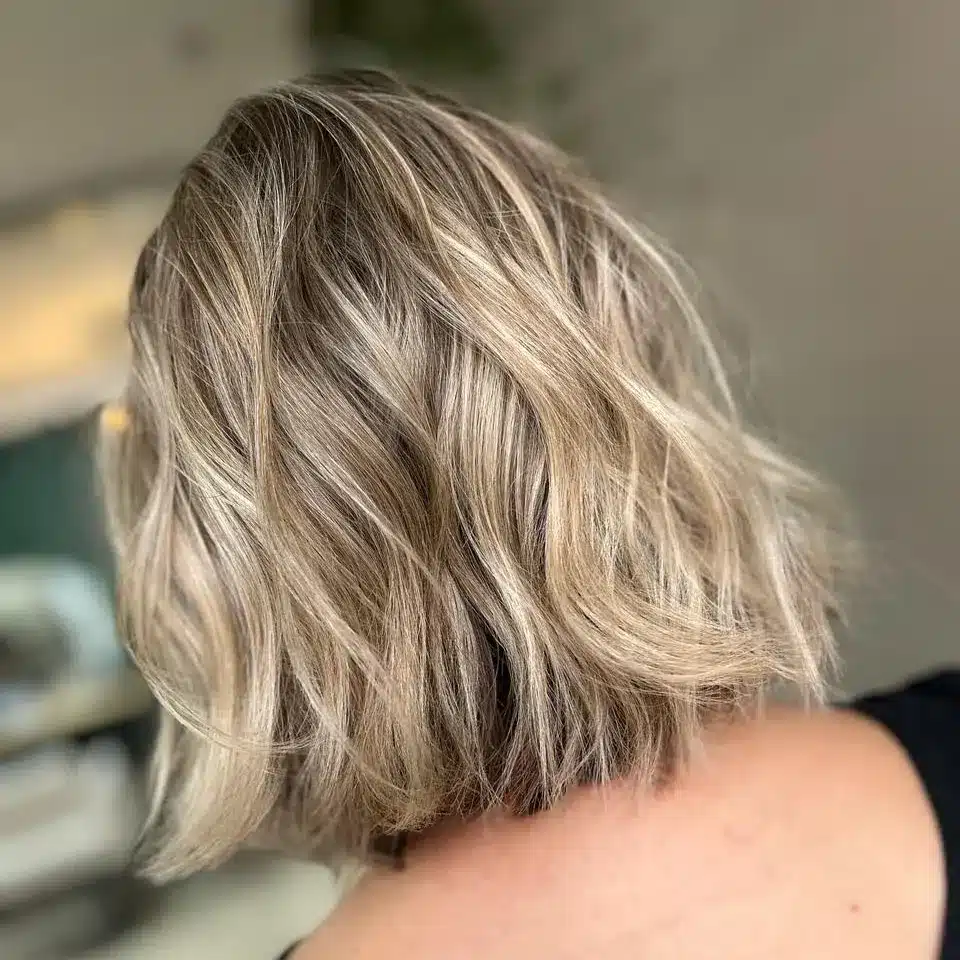22. Dimensional Cool Blonde Wavy Wispy Bob - Wispy Bob Hairstyles