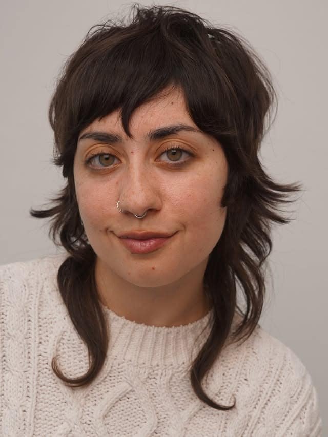 6. Short Dark Shag with Piecey Bangs - Short Shaggy And Wispy Haircuts