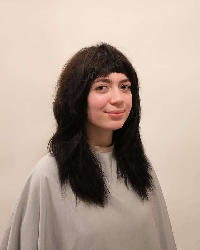 8. Long Black Wispy Shag with Blunt Micro Bangs - Short Shaggy And Wispy Haircuts