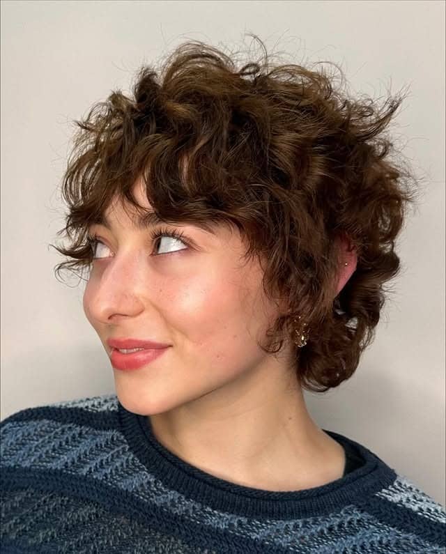 13. Short Chestnut Curly Shag with Micro Fringe - Short Shaggy And Wispy Haircuts