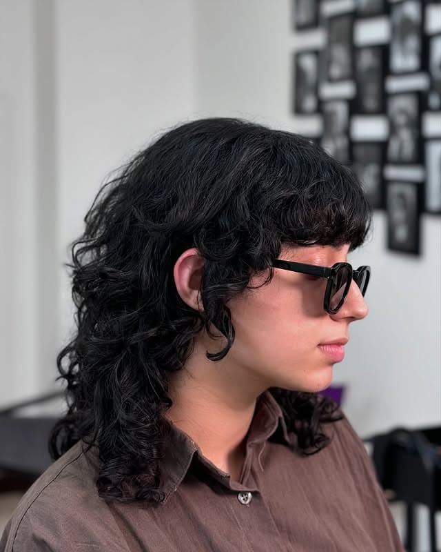 15. Soft Black Curly Shag with Rounded Layers - Short Shaggy And Wispy Haircuts