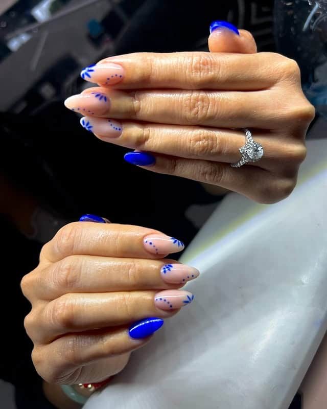 10. Nude and Blue French Tip Floral Nails - blue nail ideas