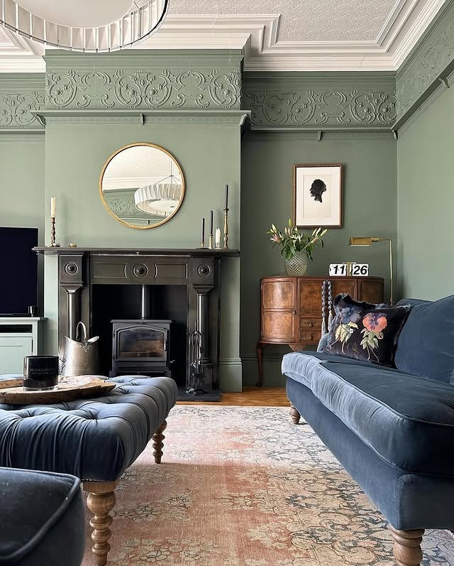 2. Classic Olive Green Living Room with Traditional Detailing - green living room ideas