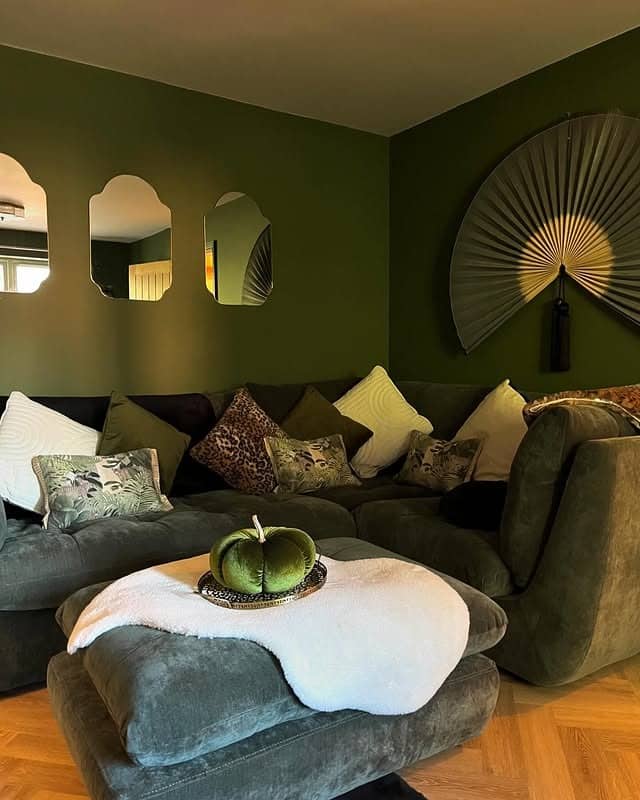 11. Deep Olive Green Lounge with Textured Layering - green living room ideas