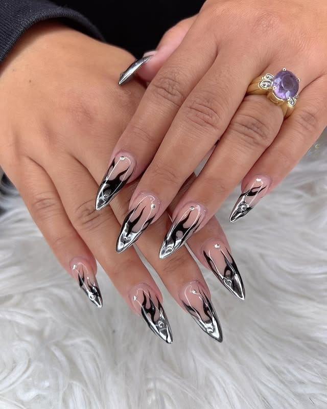 4. Chrome Flame Stiletto Nails in Black and Silver - bling nail ideas