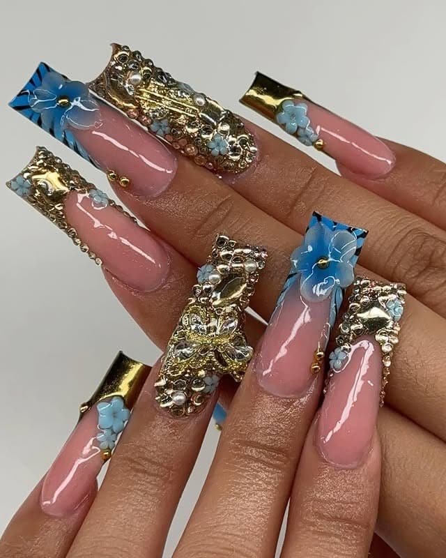 10. Nude Coffin Nails with Blue Floral and Gold Details - bling nail ideas