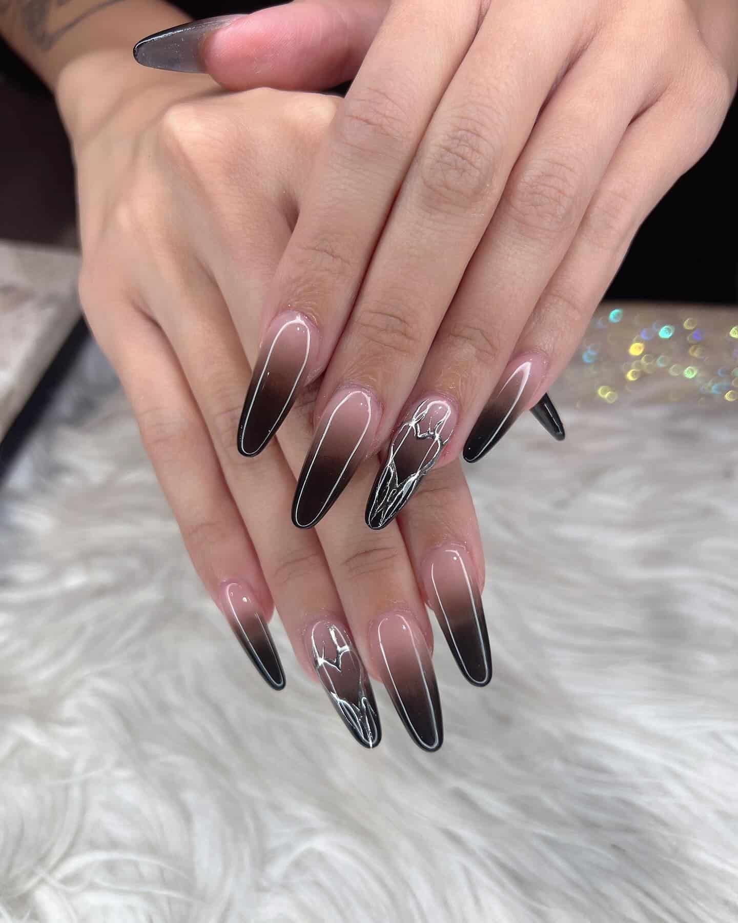 14. Black Ombre Stiletto Nails with Silver Line Art - bling nail ideas