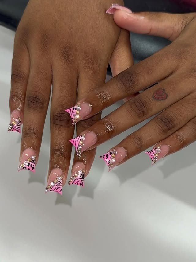 17. Pink Square Nails with Zebra Tips and Rhinestone Embellishments - bling nail ideas