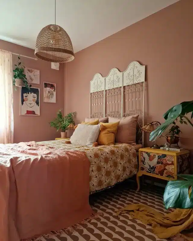 2. Warm Terracotta Bedroom with Vintage Accents - eclectic bedroom ideas