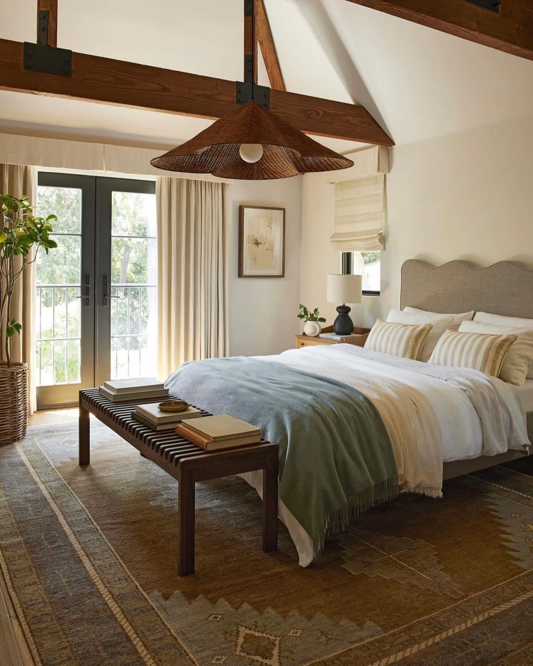 16. Rustic Neutral Bedroom with Warm Wood and Soft Layers - eclectic bedroom ideas