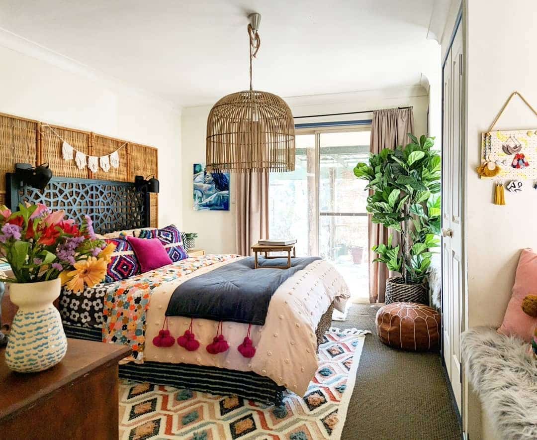 20. Bohemian Bright Bedroom with Patterned Textiles and Natural Materials - eclectic bedroom ideas