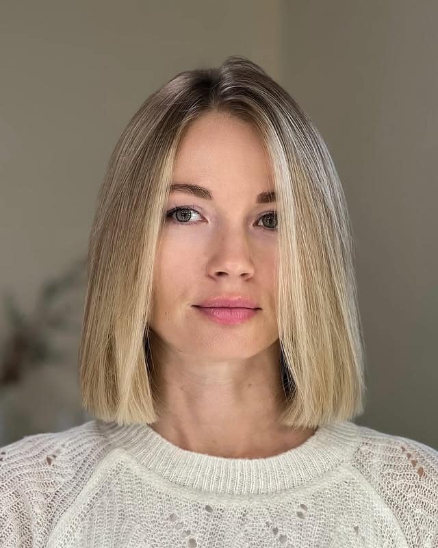6. Neutral Blonde Blunt Bob with Center Part - Blunt Cut Bob
