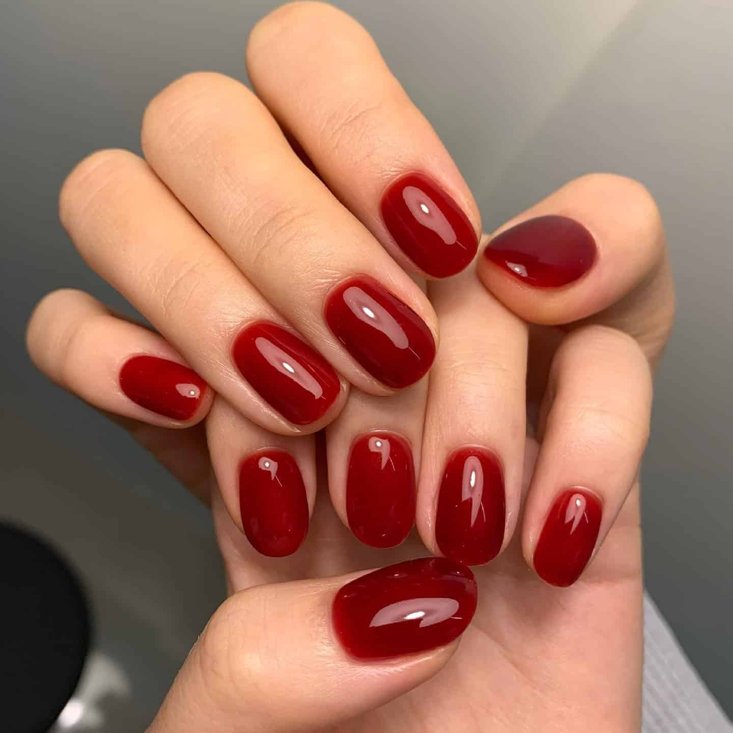3. Classic Glossy Red Oval Nails - easy nail ideas