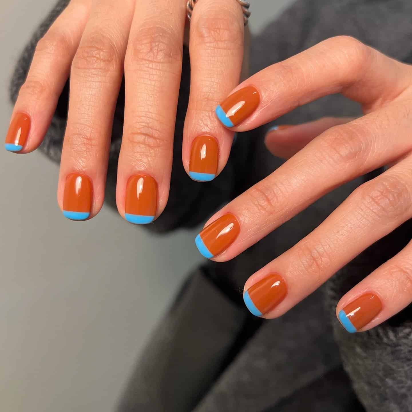 4. Burnt Orange and Sky Blue French Tips - easy nail ideas