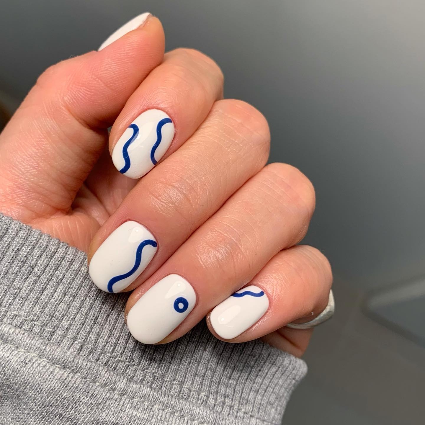 20. White and Blue Abstract Line Nails - easy nail ideas