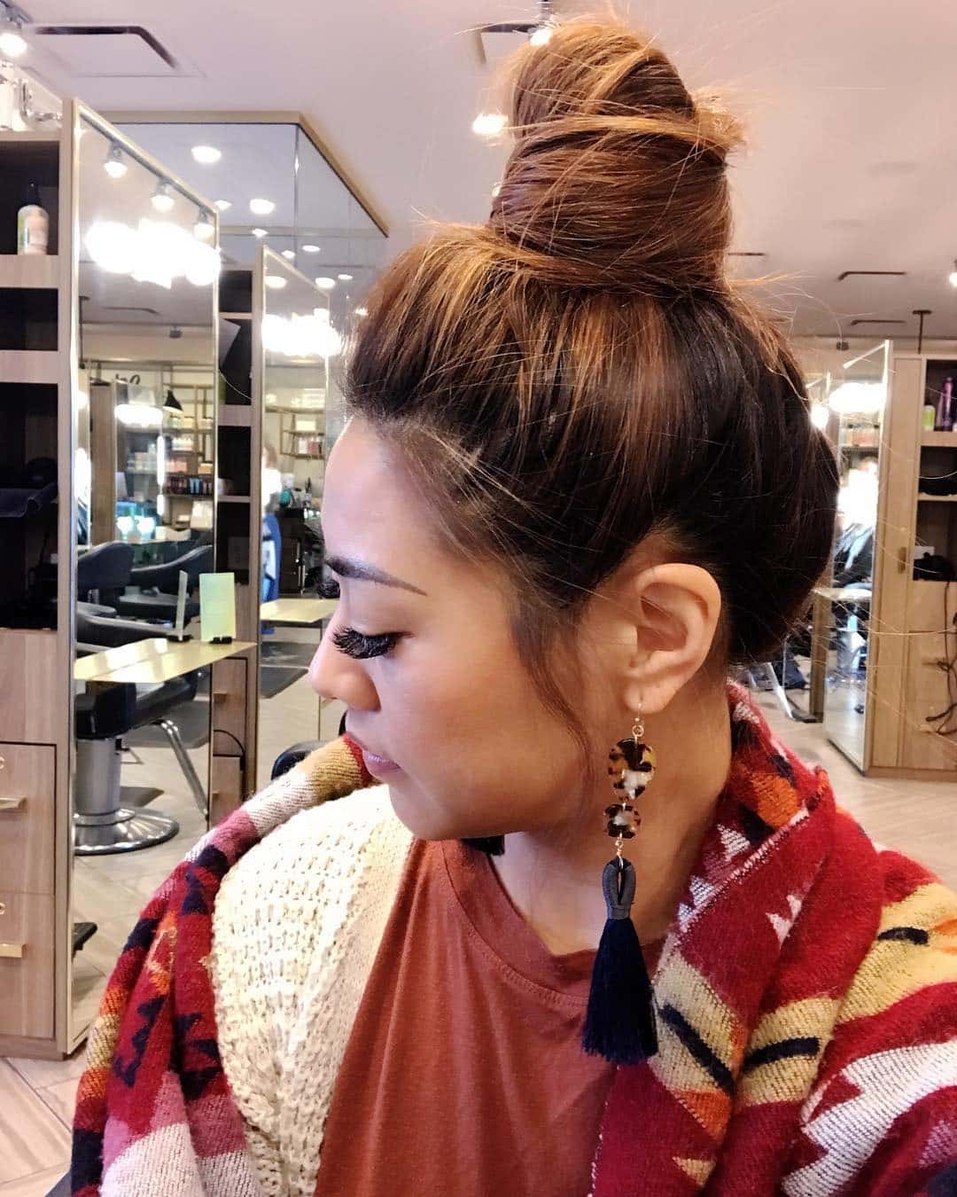 1. Textured Auburn High Top Knot - Top Knot Hairstyles