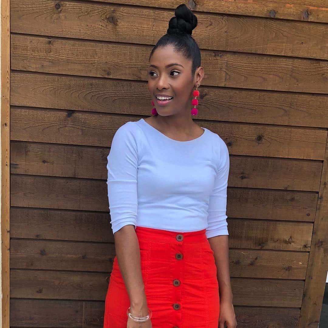 5. Classic Jet Black Elevated Knot - Top Knot Hairstyles