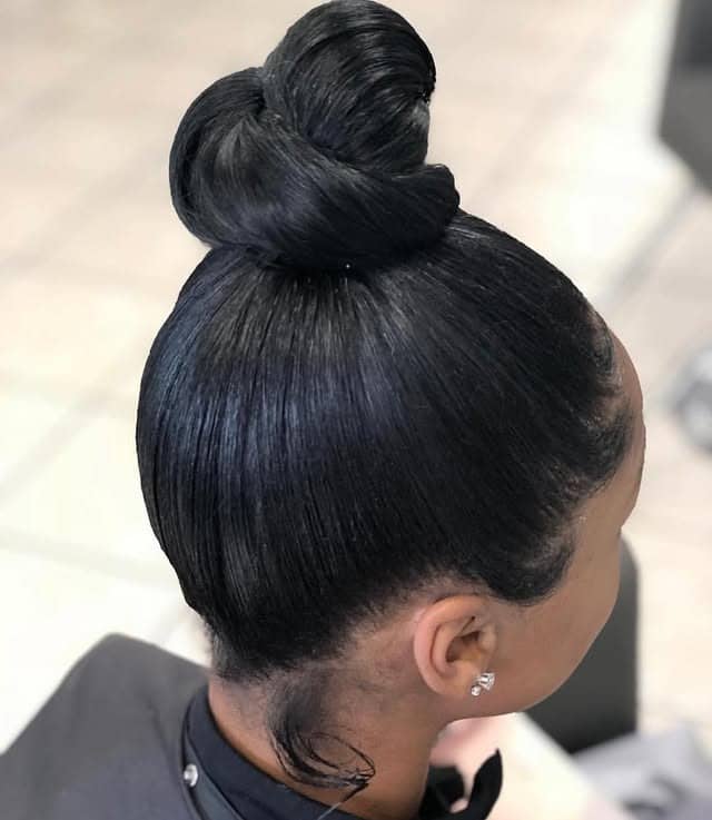 10. Glossy Black Wrapped Top Knot - Top Knot Hairstyles