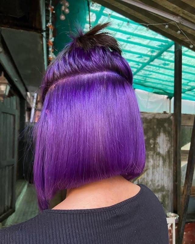 11. Bold Violet Blunt Bob Top Knot - Top Knot Hairstyles
