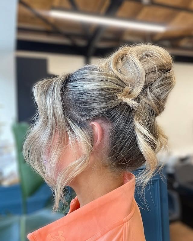 17. Cool-Toned Blonde Textured Top Knot Updo - Top Knot Hairstyles