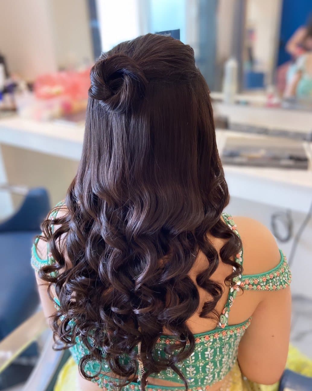 18. Rich Espresso Half-Up Knot with Defined Curls - Top Knot Hairstyles