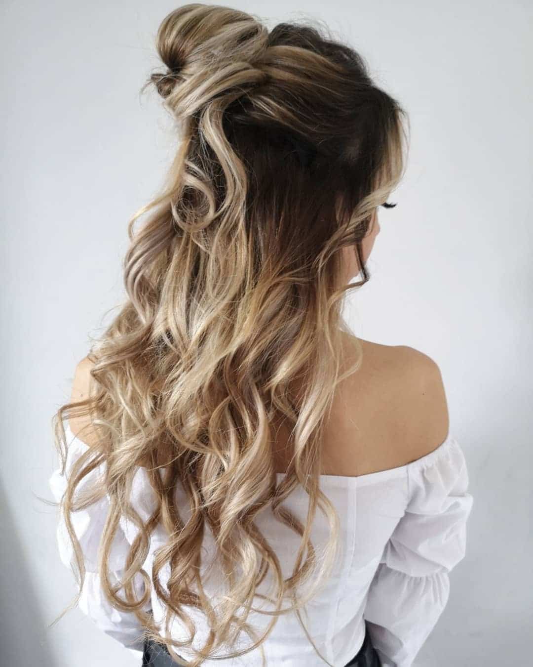 19. Creamy Blonde Balayage Half-Up Knot with Waves - Top Knot Hairstyles