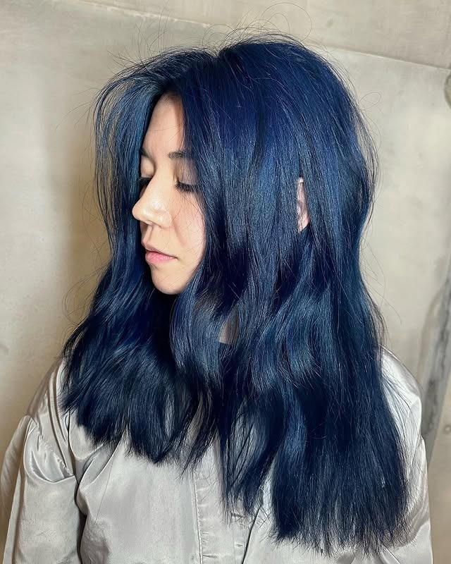 2. Soft Navy Blue Textured Waves - Smoky Blue Hair Color
