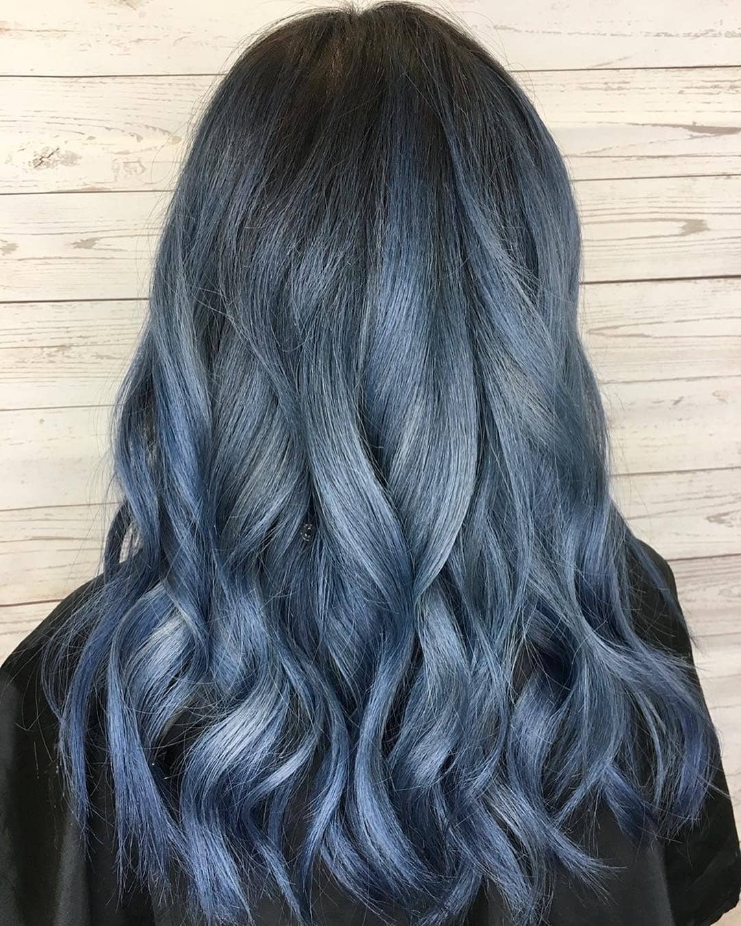 4. Steel Blue Balayage Waves - Smoky Blue Hair Color