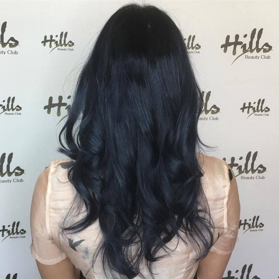 15. Inky Blue Glossy Long Layers - Smoky Blue Hair Color