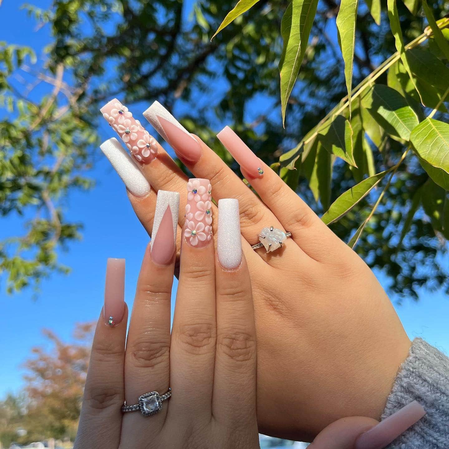 3. Soft White 3D Floral Coffin Nails with Crystal Accents - homecoming nail ideas