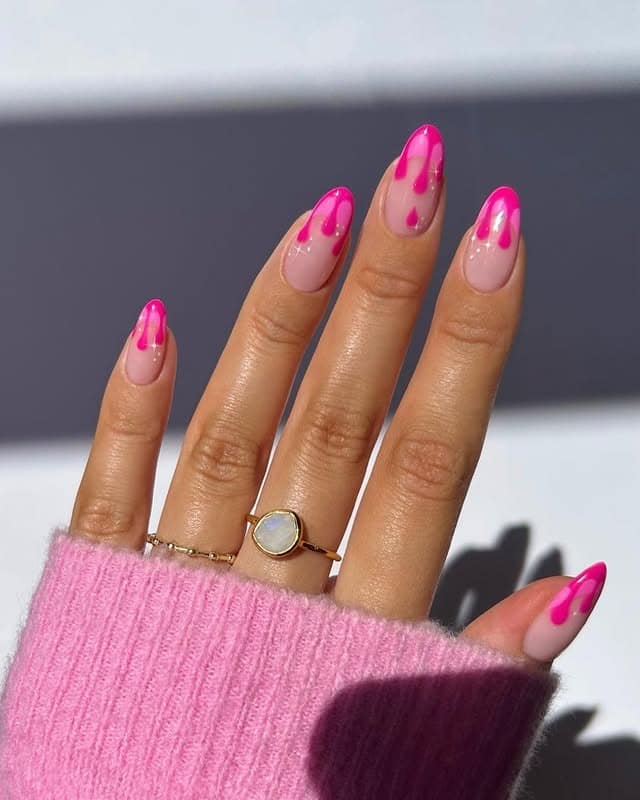 7. Pink Drip Short Almond Nails with Gloss Finish - homecoming nail ideas