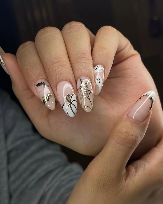 21. Nude and White Spider Web Almond Nails with Gold Accents - homecoming nail ideas
