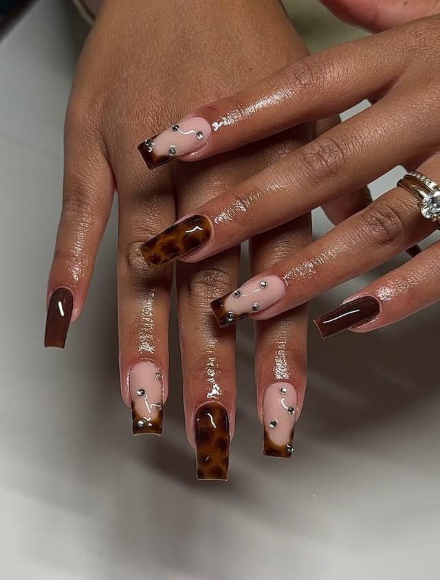 2. Chocolate Tortoiseshell Square Nails with Stud Accents - fall nail ideas