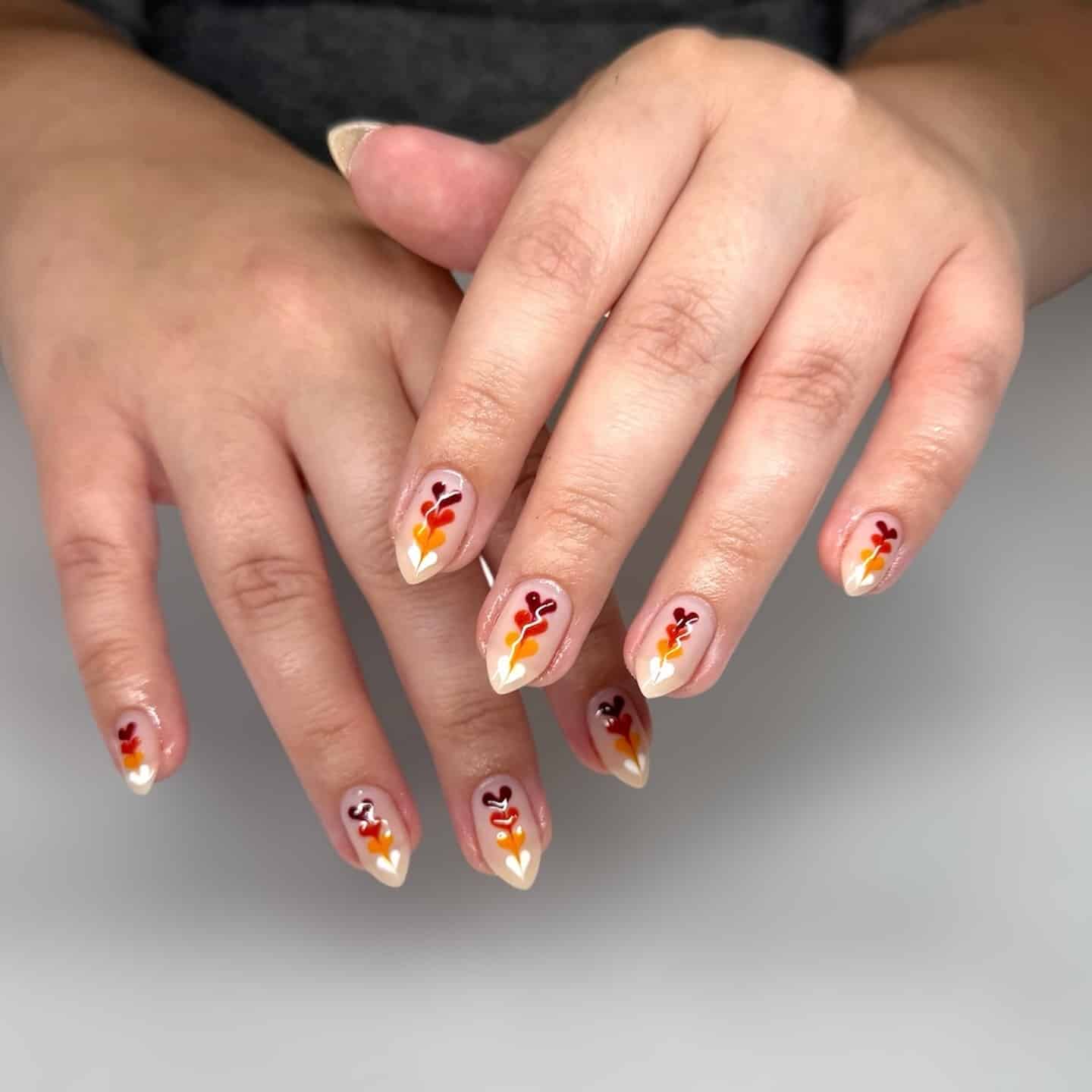 11. Autumn Leaf Almond Nails in Cream and Burnt Orange - fall nail ideas
