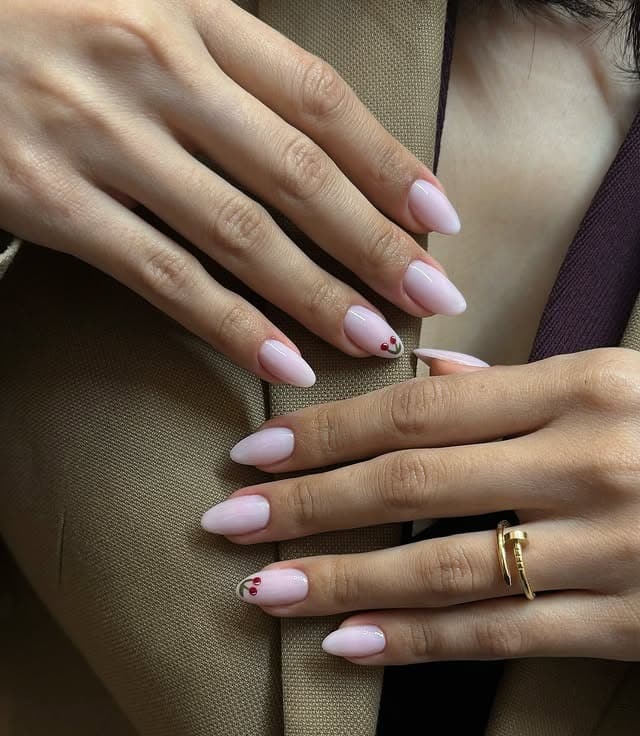 16. Soft Pink Almond Nails with Minimal Cherry Accent - fall nail ideas