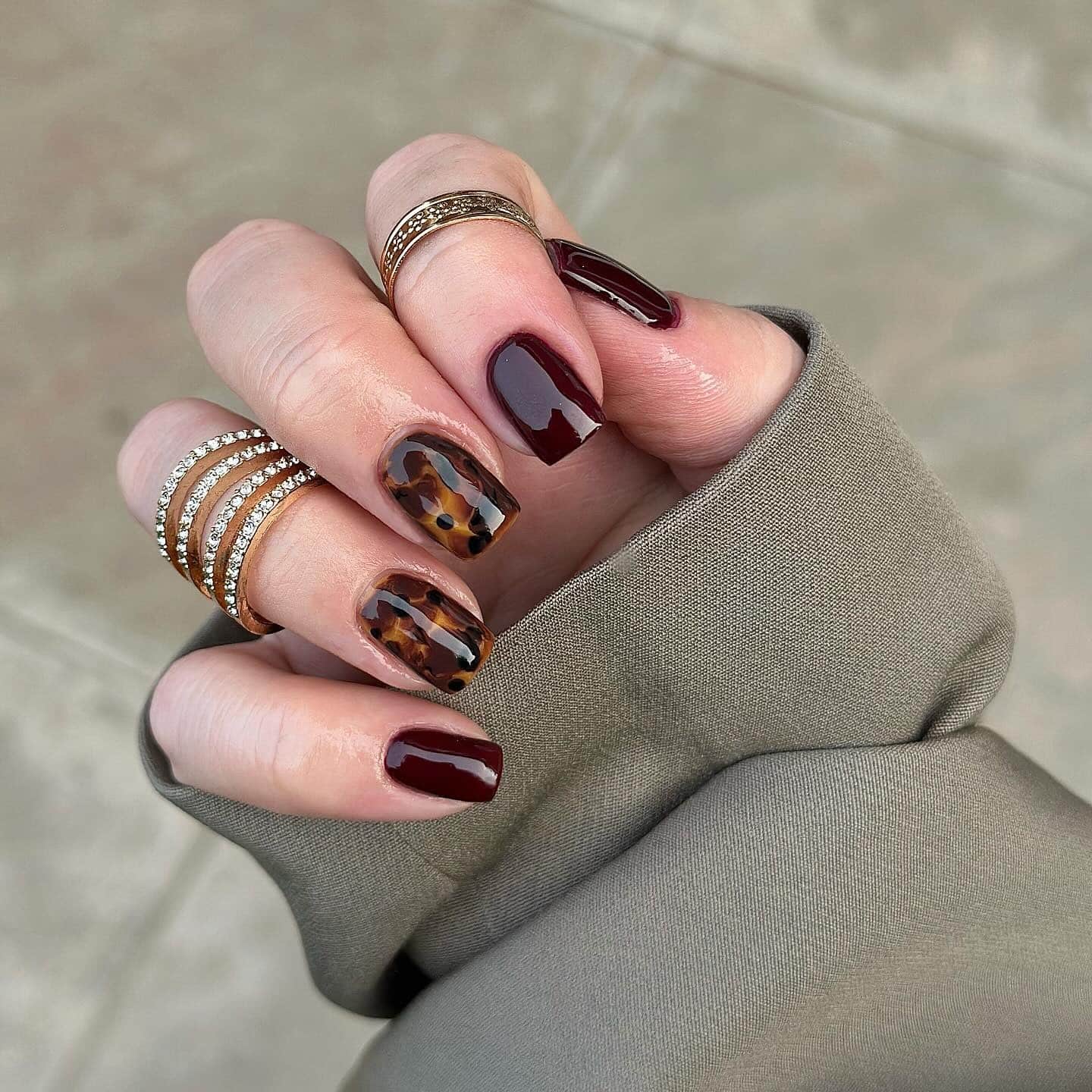 21. Burgundy Gloss and Tortoiseshell Short Square Nails - fall nail ideas
