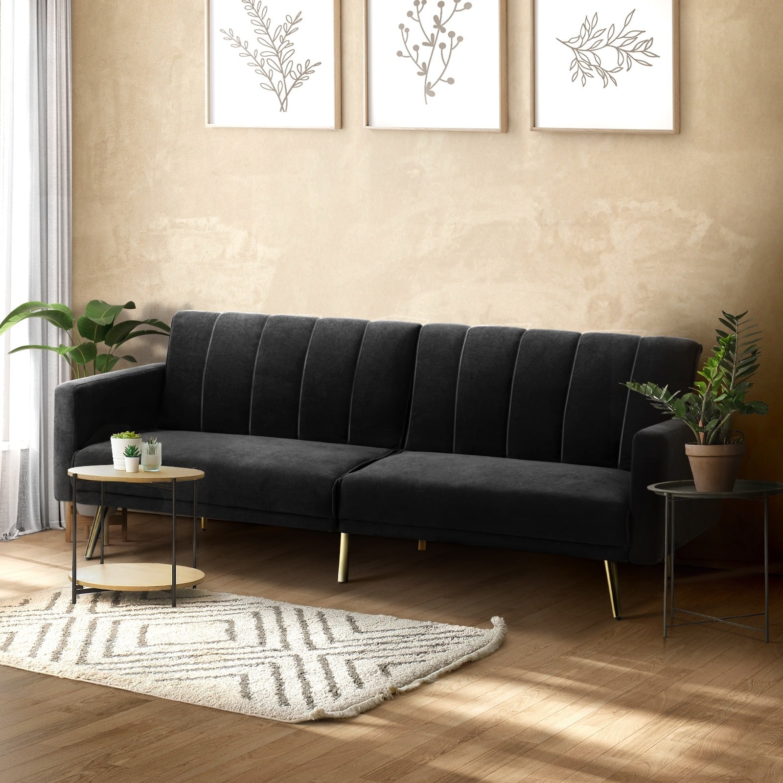 2. Soft Contemporary Black Sofa with Neutral Decor - black sofa living room ideas