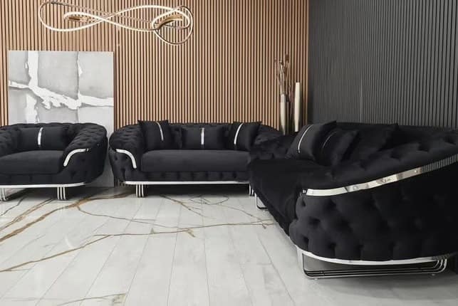 11. Black Tufted Sofa Set with Wood Panel Accent - black sofa living room ideas