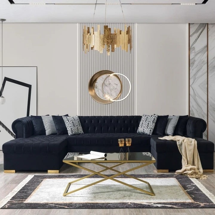 15. Black Sectional with Gold and Marble Accents - black sofa living room ideas
