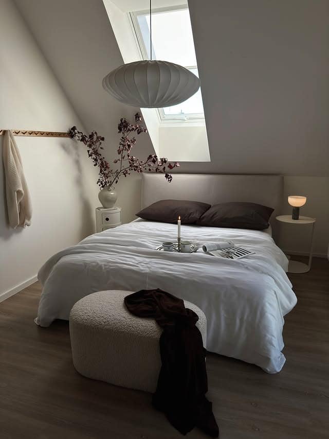 13. Minimal Attic Bedroom in Soft White and Espresso - aesthetic bedroom ideas
