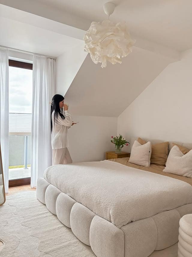 19. Soft Minimal Attic Bedroom with Cream and Natural Light - aesthetic bedroom ideas