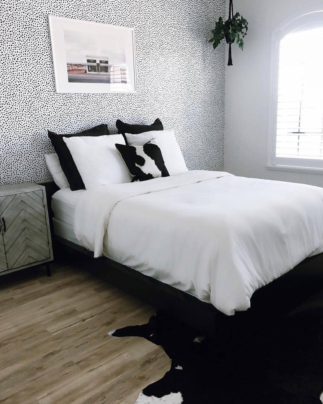 2. Monochrome Bedroom with Patterned Accent Wall - black and white bedroom ideas