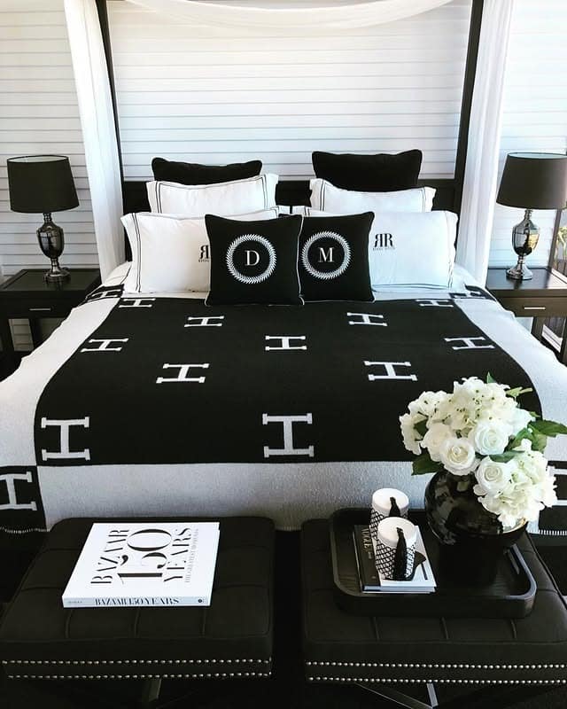6. Elegant Monochrome Bedroom with Layered Pillows - black and white bedroom ideas